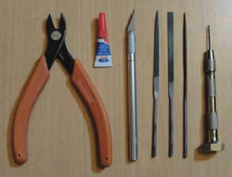 Tools and Supplies Needed (Clippers, Super Glue or Plastic Model Glue, Hobby Knife, Fine Grit Hobby Files or Sandpaper, and Hand Drill with 1/16 bit).